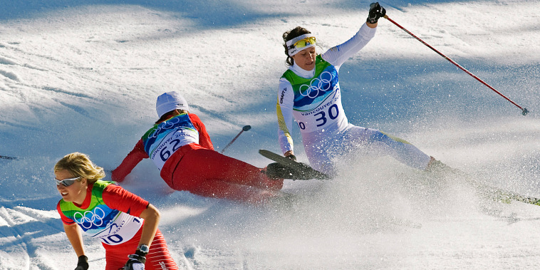 Norway's Vibeke Skofterud, left, escapes a crash involving Sweden's Norgren Johansson, right, and Poland's Paulina Maciuszek in the women's 15-kilometer pursuit cross country skiing event at Whistler Olympic Park on Feb. 19, 2010, at the 2010 Vancouver Olympic Winter Games in Whistler, B.C. Many top Nordic skiers and biathletes say crashes are becoming more common as climate change reduces the availability of natural snow, forcing racers to compete on tracks with the manmade version.