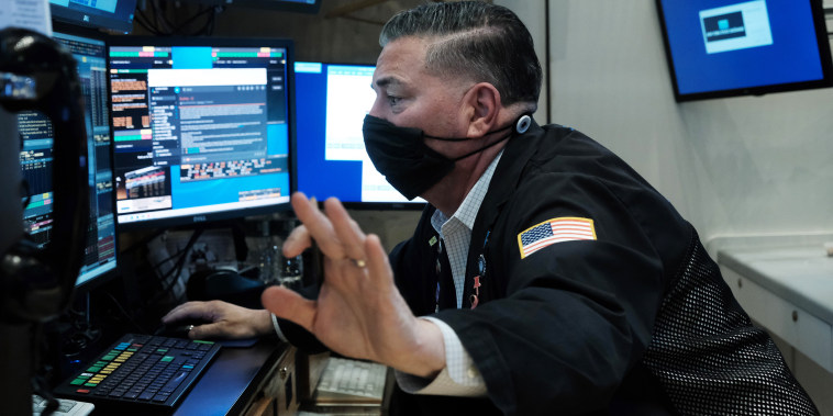 Image: A trader works on the floor of the New York Stock Exchange on Jan. 18, 2022.