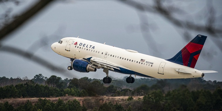 A Delta Airlines plane departs Raleigh-Durham International Airport (RDU) in Morrisville, N.C., on Jan. 20, 2022.