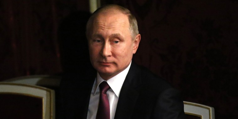 Russian President Vladimir Putin receives CEO of BASF Kurt Bock at the Kremlin