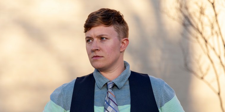 Rachel Stonecipher, a former teacher at MacArthur High School in Irving, Texas, stands outside the school on March 31, 2022.
