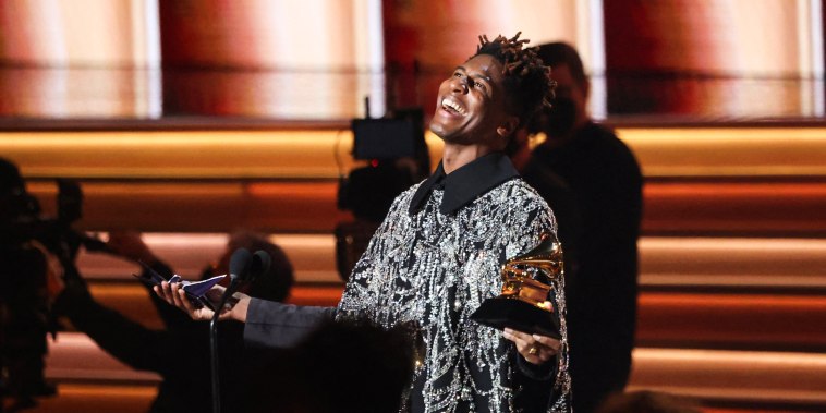 Jon Batiste accepts the Grammy award for Album of the Year for "We Are" during the 64th Annual Grammy Awards show in Las Vegas on April 3, 2022.