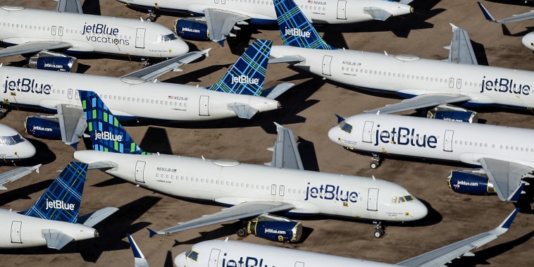 Decommissioned and suspended jetBlue commercial aircrafts are stored in Pinal Airpark on May 16, 2020, in Marana, Ariz.