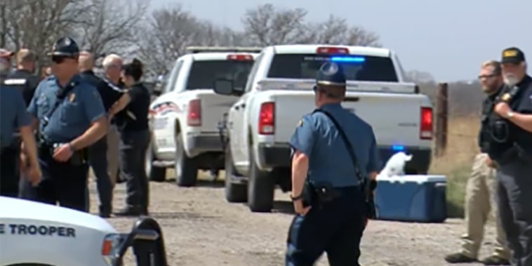 Three deputies were injured and a suspect was killed during a shooting Friday in Kansas, officials said.