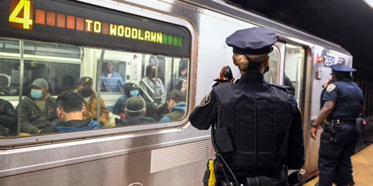 Image: NYPD investigate an incident on a train on April 12, 2022 in New York City.