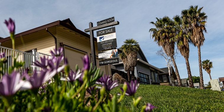 A "For Sale" sign outside a house in Discovery Bay, Calif., on March 31, 2022.