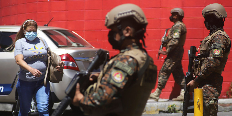 Image: Soldiers man a checkpoint at the entrance to the Las Palmas Community, in San Salvador, El Salvador, March 27, 2022.