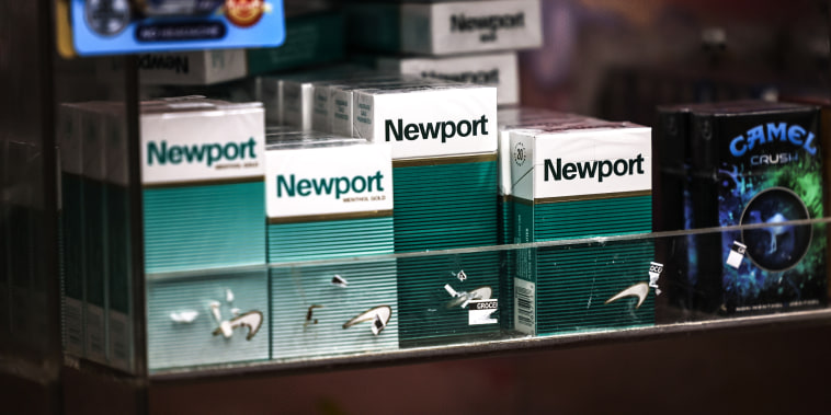 Packs of Newport cigarettes are seen on a shelf in a grocery store in the Flatbush neighborhood on April 29, 2021 in Brooklyn, N.Y.