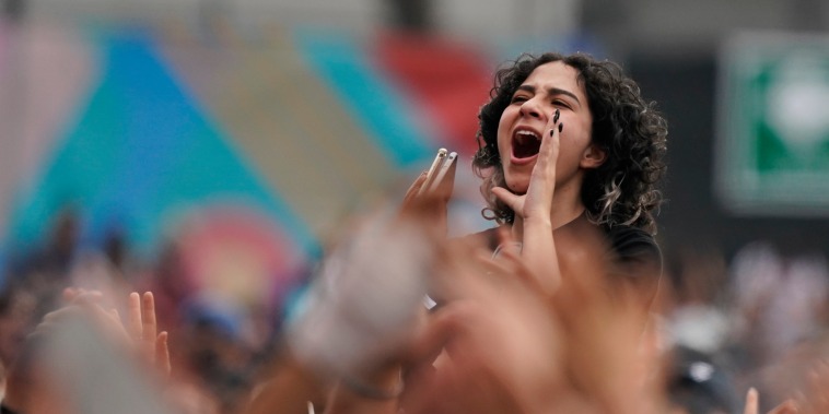 A fan cheers during the 22nd Vive Latino music festival in Mexico City on March 20, 2022.