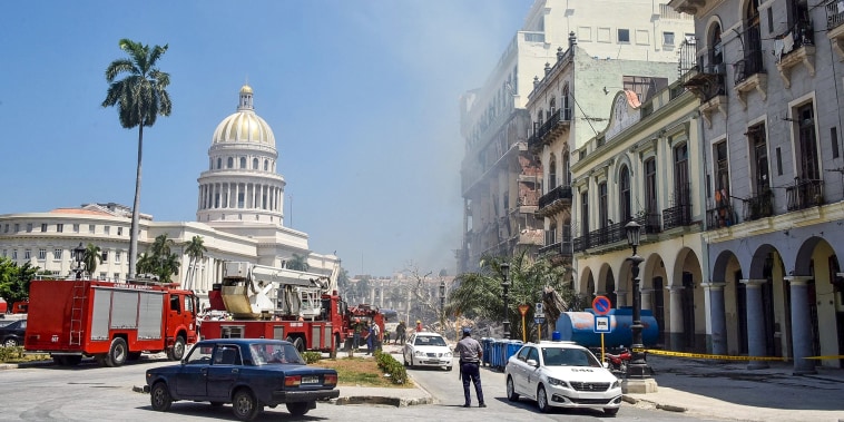 Image: Rescuers work after an explosion in the Saratoga Hotel in Havana, on May 6, 2022.
