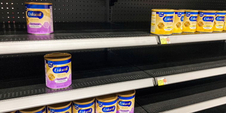 Cans of baby formula are displayed at a Walmart grocery store in Orlando, Fla., on May 8, 2022.