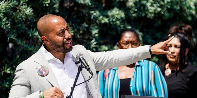 Charles Johnson announces a lawsuit outside Cedars-Sinai Medical Center on May 4, 2022, in Los Angeles. Johnson's wife Kira died at the hospital in 2016 from complications after giving birth by cesarean section.