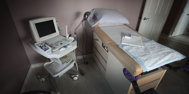 Image:  An ultrasound machine sits next to an exam table in an examination room at Whole Woman's Health of South Bend on June 19, 2019 in South Bend, Ind.