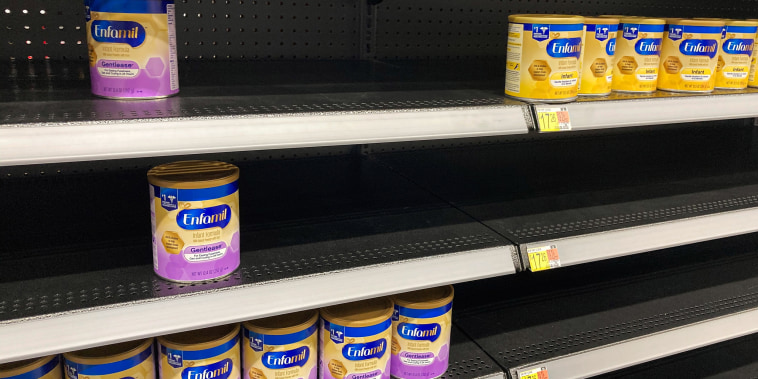 A baby formula display shelf is seen at a Walmart grocery