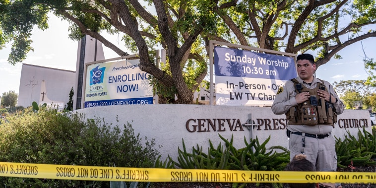 Image: An Orange County Sheriff's Department officer guards the grounds at Geneva Presbyterian Church in Laguna Woods, Calif., on May 15, 2022, after a fatal shooting.