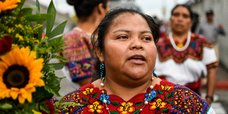 Guatemalan migrant Juana Alonzo leaves La Aurora international airport in Guatemala City on May 22, 2022.