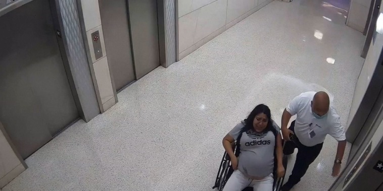Security footage showed Perez going into the elevator and coming out with a baby.