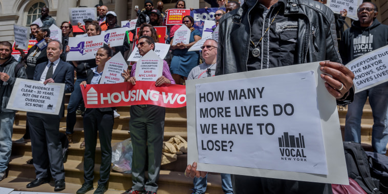 At the steps of City hall, the elected officials, Black and