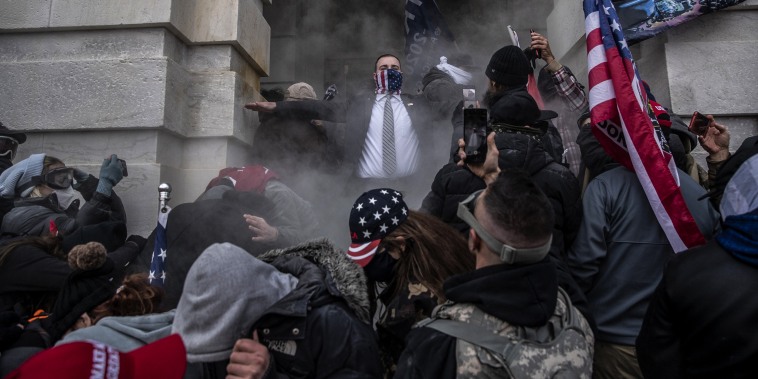 Demonstrators attempt to breach the U.S. Capitol building during a protest in Washington on Jan. 6, 2021.