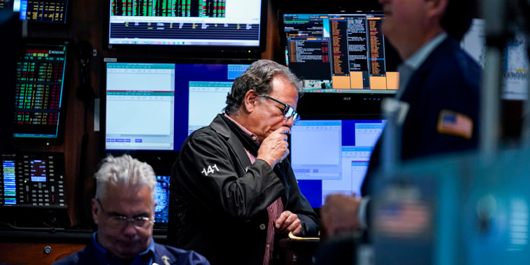 Traders work on the floor at the New York Stock Exchange on June 15, 2022.