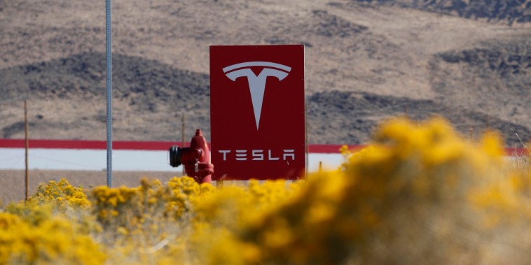 A sign marks the entrance to the Tesla Gigafactory in Sparks, Nev., on Oct. 13, 2018.