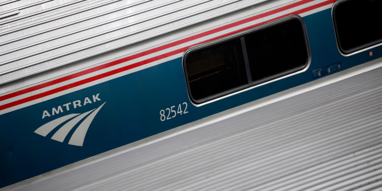 Amtrak railroad passenger cars sit parked in the coach yard at Chicago Union Station in Chicago on March 2, 2022.