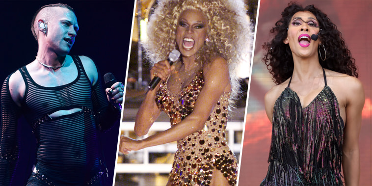 LEFT: LONDON, ENGLAND - MAY 26: Olly Alexander of Years & Years performs live on stage at Wembley Arena on May 26, 2022 in London, England. (Photo by Jim Dyson/Getty Images)

CENTER: RuPaul at VH1 Divas 2000: Tribute to Diana Ross held at the theatre in Madison Square Garden on April 9, 2000 in NYC   Photo Frank Micelotta/ImageDirect

RIGHT: LOS ANGELES, CALIFORNIA - JUNE 11: Michaela Jaé performs onstage during LA Pride's Official In-Person Music Event "LA Pride In The Park" Presented by Christopher Street West (CSW) at Los Angeles Historical Park on June 11, 2022 in Los Angeles, California. (Photo by Emma McIntyre/Getty Images)