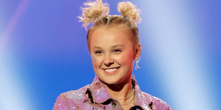 In this image released on June 14, Jojo Siwa performs onstage during a taping of P&G & iHeartMedia's Can't Cancel Pride 2022 – PROUD and TOGETHER at iHeartRadio Theater on May 12, 2022 in Burbank, California. The full event will stream on June 14 at 8 p.m. ET / 5 p.m. PT on iHeartRadio's TikTok, YouTube and Facebook, pages as well as iHeartRadio's PrideRadio.com and Revry. (Photo by Kevin Winter/Getty Images for iHeartRadio)