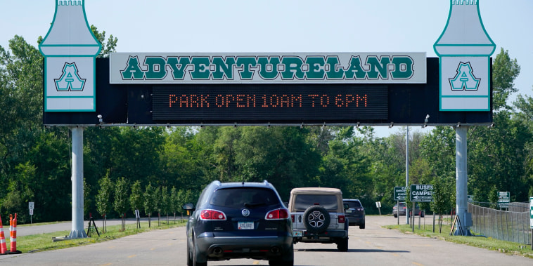 Visitors arrive at the Adventureland Park amusement park, on July 6, 2021, in Altoona, Iowa.