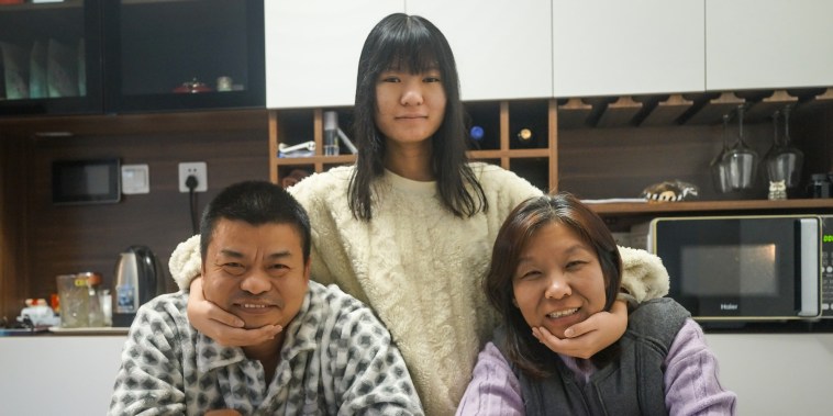 Zhifan Dong with her mom and dad.