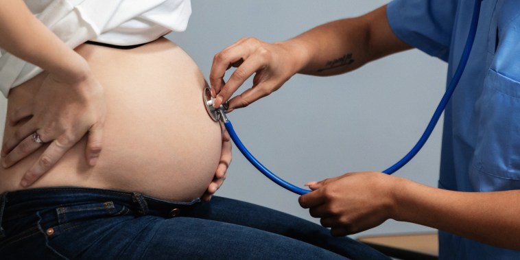Image: A pregnant woman during a prenatal check up.