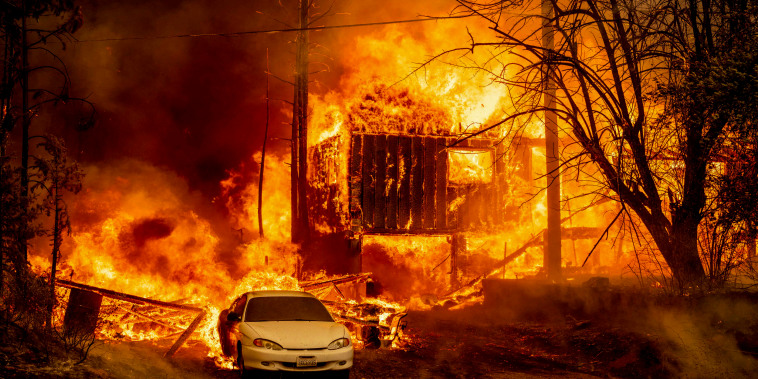 Image:  A home is engulfed in flames as the Dixie fire rages on in Greenville, Calif. on August 5, 2021.