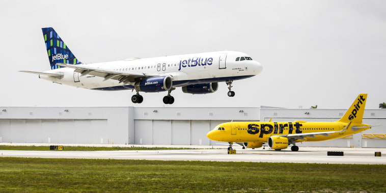 JetBlue and Spirit airplanes at Fort Lauderdale-Hollywood International Airport in Fort Lauderdale, Fla., on May 21, 2022.