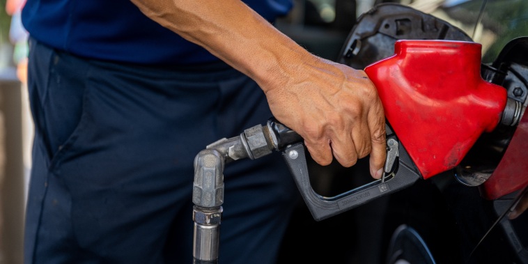 Image:  A customer pumps gas at an Exxon gas station on July 29, 2022 in Houston.