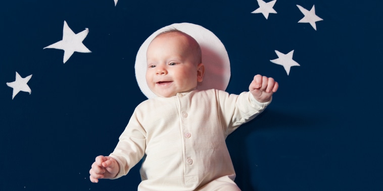 Infant on blue background