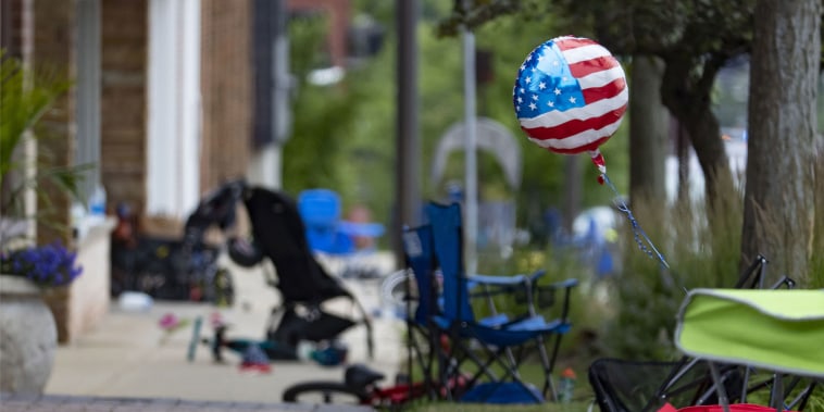 Chairs, bicycles, strollers and balloons were left behind at the scene of a mass shooting on the Fourth of July parade route along Central Avenue in Highland Park.