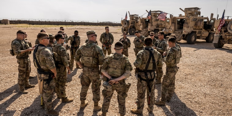 Image: U.S. Army soldiers prepare to go out on patrol from a remote combat outpost on May 25, 2021 in northeastern Syria.