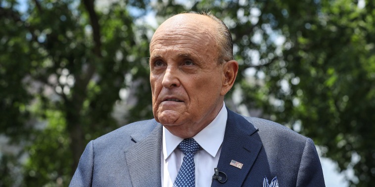 President Donald Trump's lawyer and former New York City Mayor Rudy Giuliani talks to journalists outside the White House West Wing on July 1, 2020.