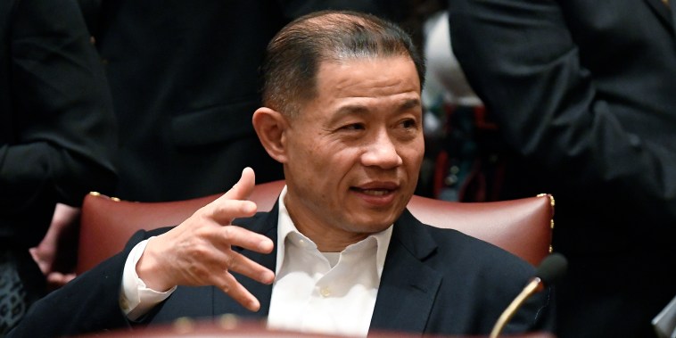 Sen. John Liu, D-Queens, talks to Senate members at the Capitol in Albany, N.Y., in 2019.