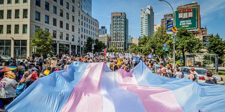 A giant trans flag held by participants of the Reclaim Pride Coalition's (RPC) fourth annual Queer Liberation March, on June 26, 2022 in New York.