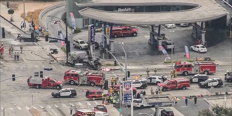 At least four people were killed in a fiery crash involving at least six cars at an intersection in Los Angeles' Windsor Hills area on Thursday.