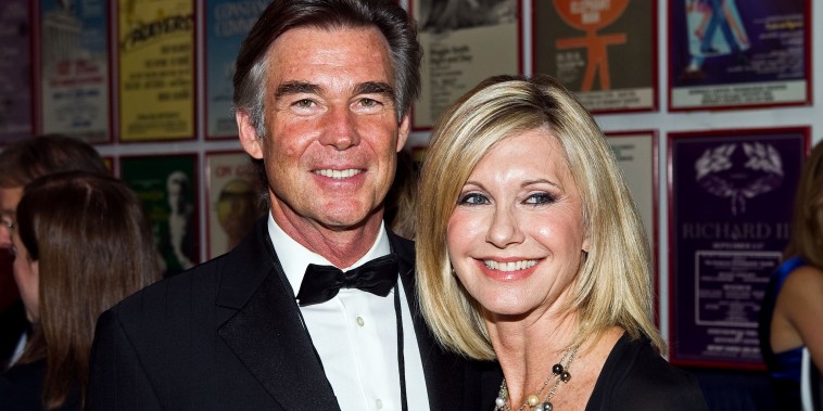 Olivia Newton-John and her husband, John Easterling, attend Honoring The Promise, celebrating the 30th anniversary of the Promise at The John F. Kennedy Center for Performing Arts, on Oct. 16, 2010, in Washington, D.C.