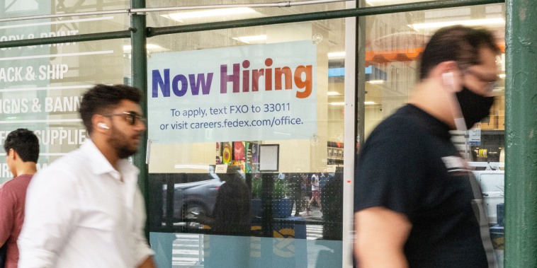 A "now hiring" sign