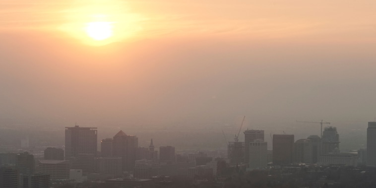 Atmospheric inversion traps smog and air pollution over Salt Lake City, Utah, USA