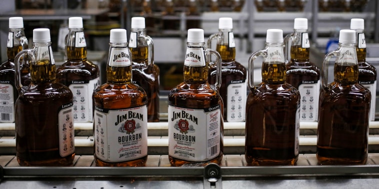 Bottles of bourbon make their way down a conveyor belt inside the bottling plant at the Jim Beam Bourbon Distillery on Jan. 13, 2014 ,in Clermont, Ky.