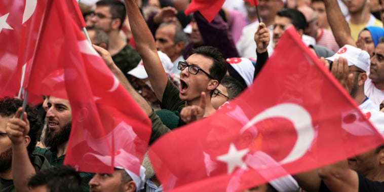 Turkish demonstrators chant during an anti-LGBTQ+ protest