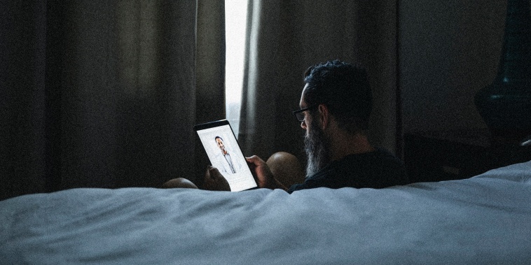 Man consulting with doctor on video call