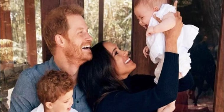 Prince Harry and Meghan Markle with their family.