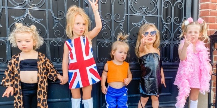 Young girls are dressed as the Spice Girls for Halloween.