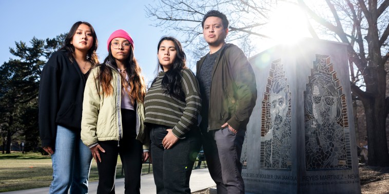 From left, Members of the University of Colorado student group United Mexican American Students y MECHA Sonia Espinosa, Jaqueline Rangel, Jessica Valadez Fraire, and Mateo Vela stand next to Los Seis de Boulder monument in Boulder, Colo. on campus on Apr. 7, 2022.